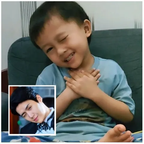 Child on Couch with Cute Gesture