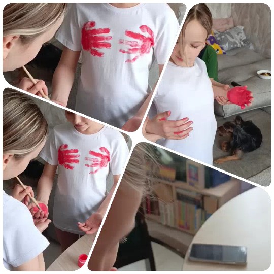 Painting Hands with Red Paint Indoors
