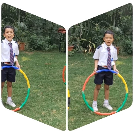 Boy with Hula Hoop in Garden