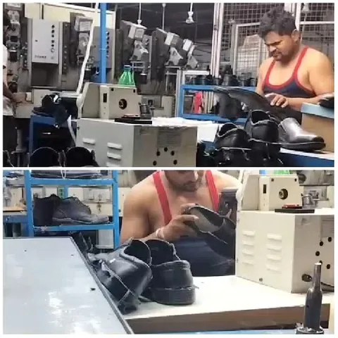 Man Inspecting Shoes in Factory