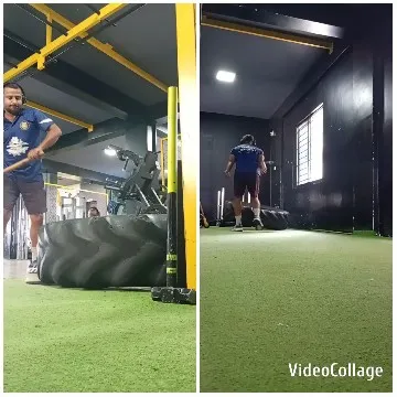 Man Swinging Sledgehammer in Gym