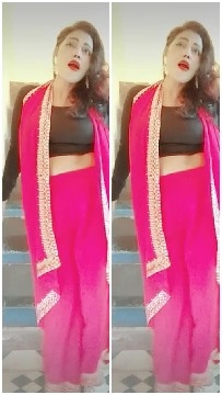 Woman in Traditional Attire on Stairs