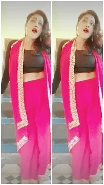 Woman in Traditional Attire on Stairs