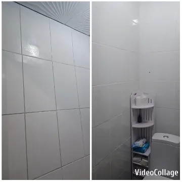 Bathroom with Tiled Walls and Supplies