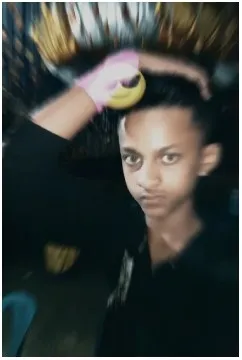 Man with Hand on Head