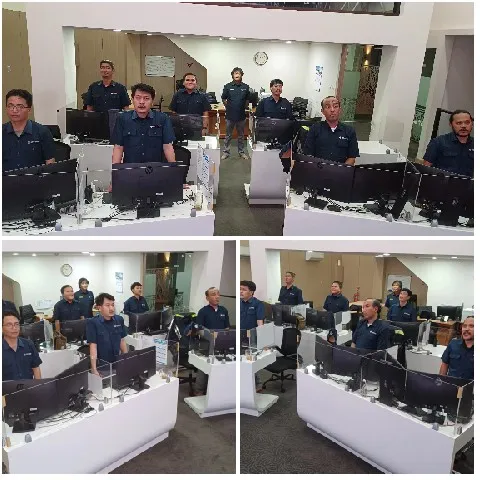 Men at Desks in Office Setting