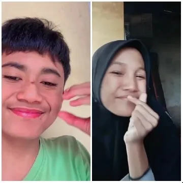 Two People Posing for Camera