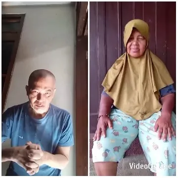 Man in Blue Shirt Clenching Hands