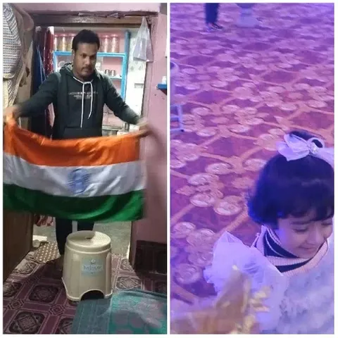 Man Holding Indian Flag And Child Smiling