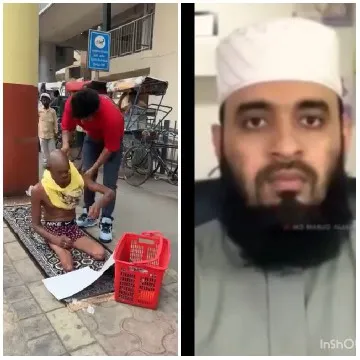 Man Sitting on Sidewalk with Assistance