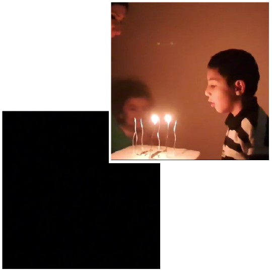 Boy Blowing Out Birthday Candles