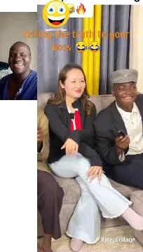 Two People Smiling on a Couch