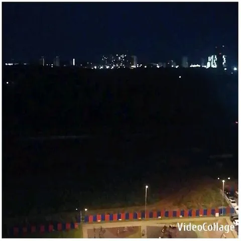 Nighttime Cityscape with Bright Lights