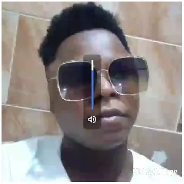 Person with Sunglasses and Neutral Expression