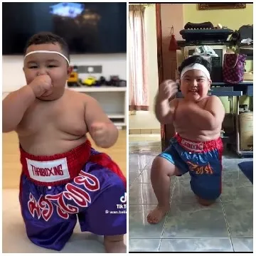 Child in Traditional Boxing Attire