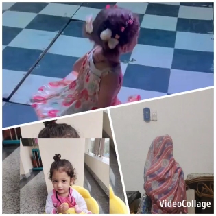 Child Spinning in Floral Dress