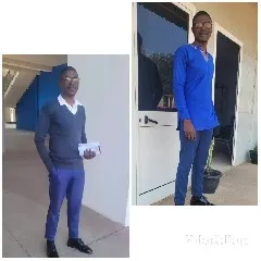 Man Outside Building in Two Outfits