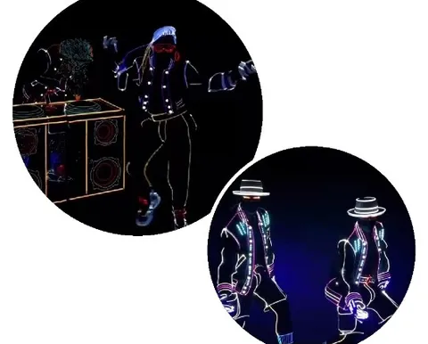 Neon Dancers Performing Together