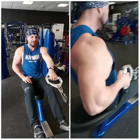 Person Using Gym Machine in Workout