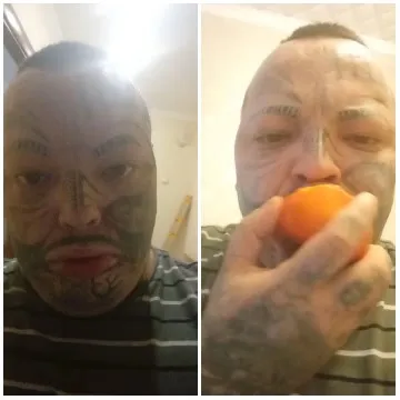 Person with Face Tattoos and Orange