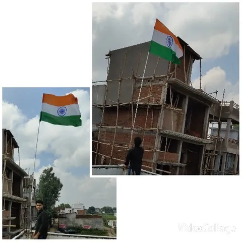 Person Holding Indian Flag on Rooftop