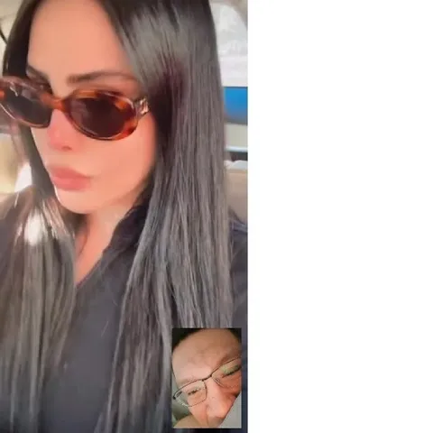 Woman in Car with Sunglasses
