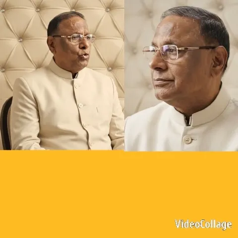 Man in Glasses Seated Against Tufted Background