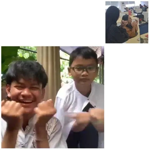 Two Boys Making Gestures Together