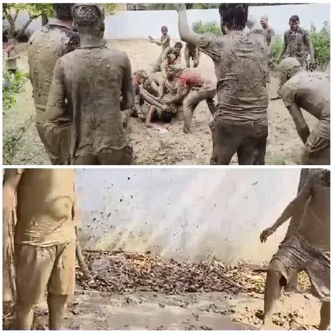 Group of People Covered in Mud