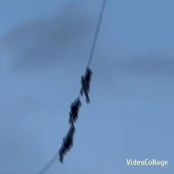People Suspended on a Rope