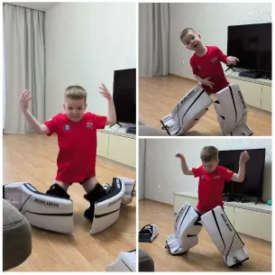 Child Playing with Hockey Pads