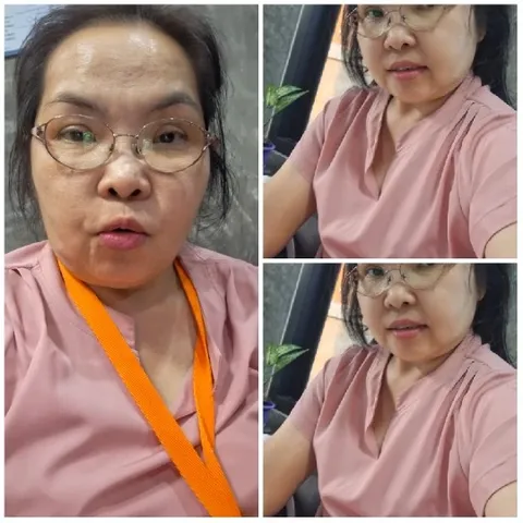 Woman with Glasses in Indoor Setting