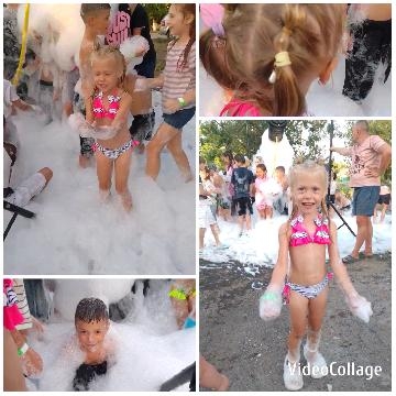 Children Playing in Foam at Event