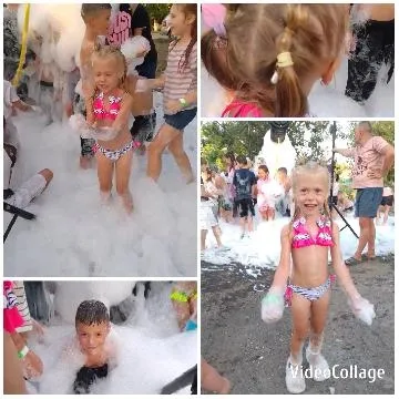 Children Playing in Foam at Event