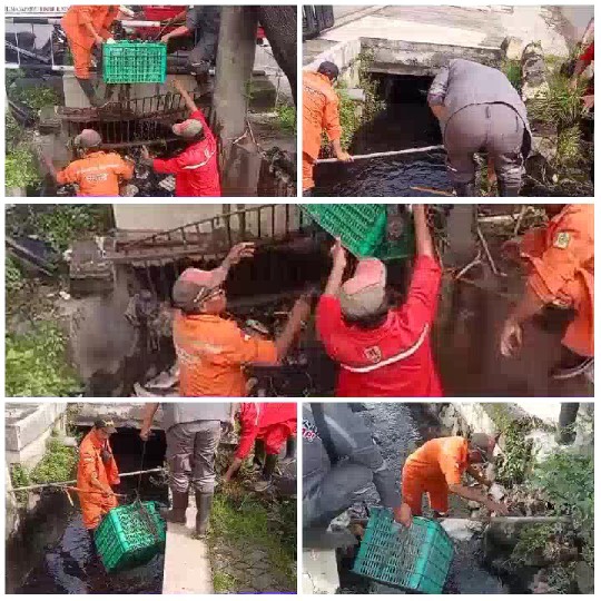 Workers Clearing Drainage Area