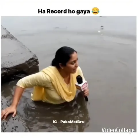 Woman Reporting from Water