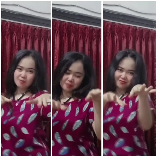 Dancing in Front of Red Curtain