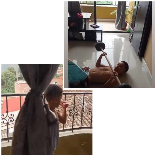 Boy Lifting Barbell at Home