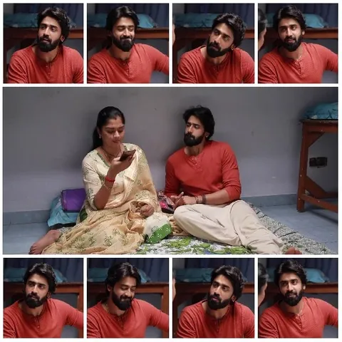 Man In Orange Shirt With Woman On Bed