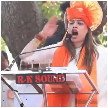 Person at Podium with Large Headpiece