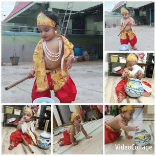 Child in Traditional Attire Playing