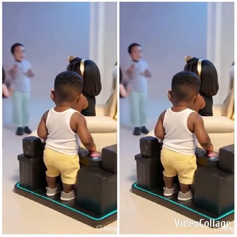 Child Pressing Button and Cheer