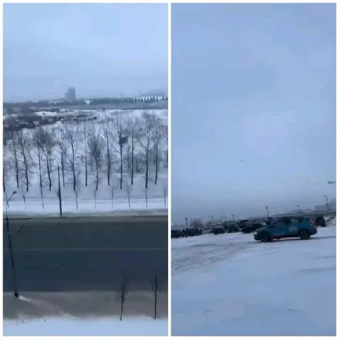 Snowy Landscape and Parking Lot