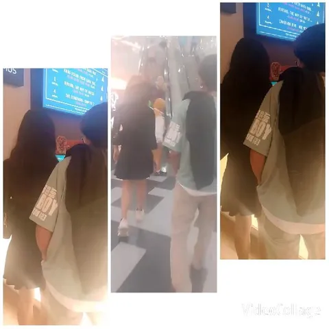 Couple Walking in Shopping Mall