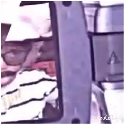 Person in Striped Shirt with Sunglasses
