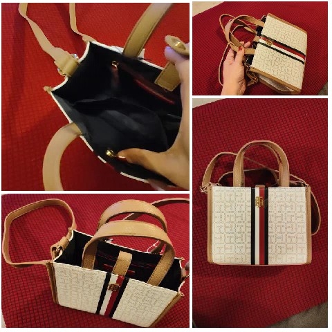Stylish Handbag on Red Surface