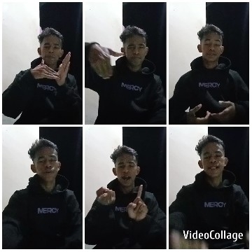 Person Gesturing in Black Hoodie