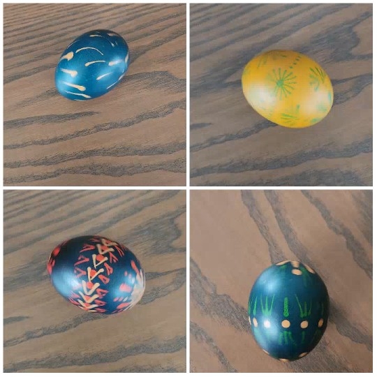 Decorated Eggs on Wood Surface