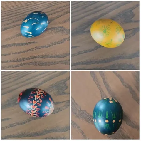 Decorated Eggs on Wood Surface