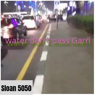 City Street at Night with Cars